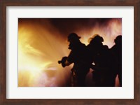 Framed Firefighters extinguishing a fire