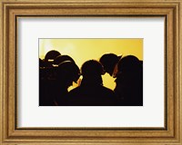 Framed Rear view of a group of firefighters looking down