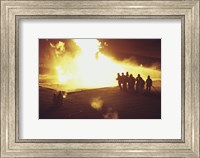 Framed High angle view of firefighters extinguishing a fire