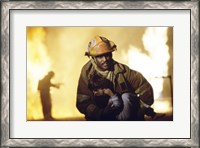 Framed Firefighter carrying a boy