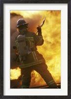 Framed Rear view of a firefighter holding an axe