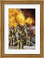 Framed Rear view of a group of firefighters extinguishing a fire vertical