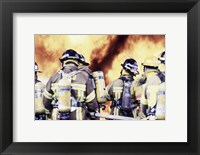 Framed Rear view of a group of firefighters holding water hoses