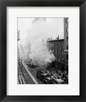 Framed New York City, Fire on East 47th Street, with fire engines shooting water on burning building