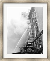 Framed Fire engine with ladder up burning building