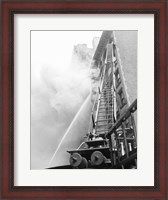 Framed Fire engine with ladder up burning building