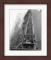 Framed Fire engine with ladder up burning building