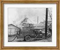 Framed Fire engine next to home in fire