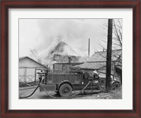 Framed Fire engine next to home in fire