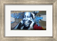 Framed Graffiti of blue smiling women with abstract background somewhere in Gdynia