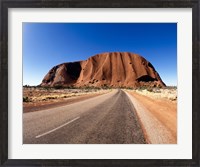Framed Road passing through a landscape, Ayers Rock, Uluru-Kata Tjuta National Park, Australia