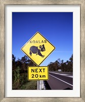 Framed Close-up of a crossing sign on the road side, Australia