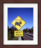 Framed Close-up of a crossing sign on the road side, Australia