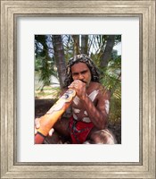 Framed Pamagirri aborigine playing a didgeridoo, Australia