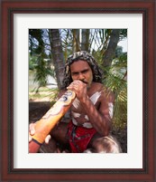 Framed Pamagirri aborigine playing a didgeridoo, Australia