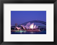 Framed Opera house lit up at dusk, Sydney Opera House, Sydney Harbor Bridge, Sydney, Australia