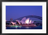 Framed Opera house lit up at dusk, Sydney Opera House, Sydney Harbor Bridge, Sydney, Australia