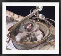 Framed Astronaut Drew Feustel Re-enters the Space Station