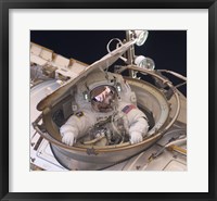 Framed Astronaut Drew Feustel Re-enters the Space Station