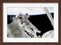 Framed Astronauts in Space