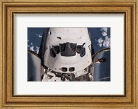 Framed Partial view of the crew cabin and forward payload bay of the space shuttle Discovery