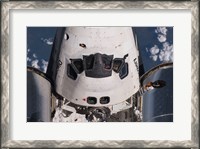 Framed Partial view of the crew cabin and forward payload bay of the space shuttle Discovery