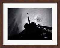 Framed Orbiter Columbia Passes Over the Eye of Typhoon Owen
