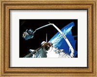 Framed Shuttle discovery Satelite deployment