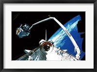 Framed Shuttle discovery Satelite deployment