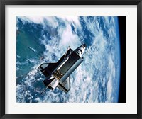 Framed Shuttle Discovery in Space