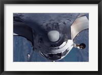 Framed Space Shuttle Discovery as it approached the International Space Station