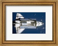 Framed STS-135 Atlantis approaches the ISS