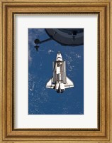 Framed STS-135 Atlantis approaches the ISS