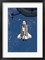 Framed STS-135 Atlantis approaches the ISS