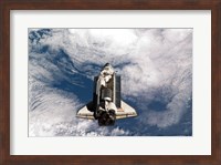 Framed STS-135 Atlantis during the Rendezvous Pitch Maneuver
