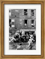 Framed People watching the cyclists being provisioned. Tour de France 1958.