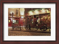 Framed Bicycles parked in front of a restaurant at night, Dublin, Ireland