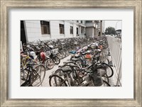 Framed Bicycles parked outside a building, Beijing, China