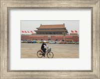 Framed Tourist riding a bicycle at a town square, Tiananmen Gate Of Heavenly Peace, Tiananmen Square, Beijing, China