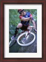 Framed Young man on a bicycle