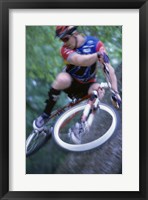 Framed Young man on a bicycle