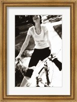 Framed Young woman riding a bicycle - black & white