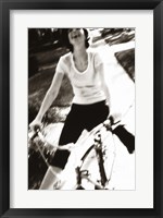 Framed Young woman riding a bicycle - black & white