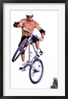 Framed Young man on a bicycle in mid-air