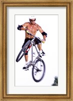 Framed Young man on a bicycle in mid-air