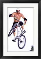 Framed Young man on a bicycle in mid-air