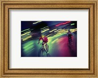 Framed Young man riding a bicycle