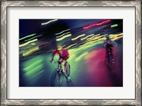 Framed Young man riding a bicycle