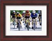 Framed Group of cyclists riding bicycles
