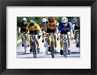 Framed Group of cyclists riding bicycles